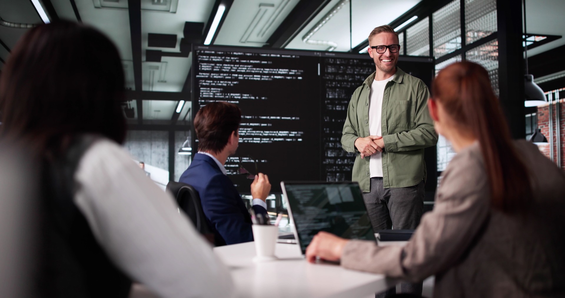Technician Leading Software Presentation At Business Meeting